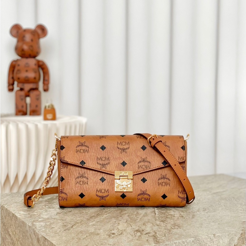 MCM Tan Monogram Clutch with Gold Accent - Picture 5 of 9